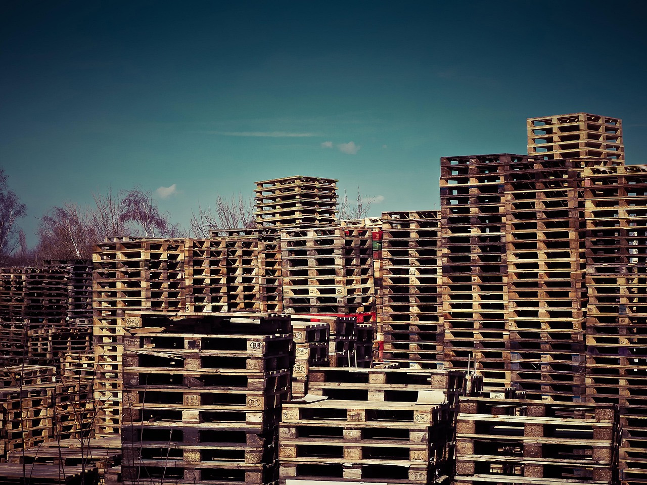 Pallets stacked in warehouse